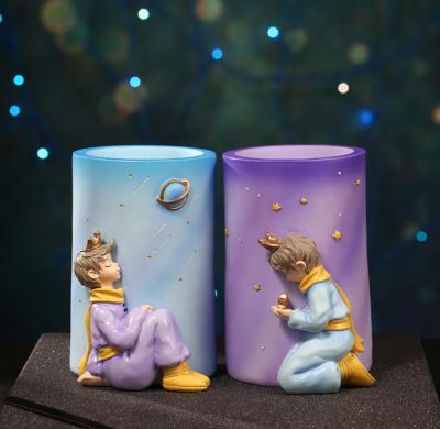 China Children's creative children's small table prince ornaments resin handwork makeup storage container pen container for sale