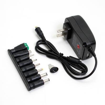 China 5v 4.5v 12v 1A 1.5A 2.5A 110V 240V CE FCC Approved AC DC Power Adapter Black Multiple Connects 85*55*34mm for sale