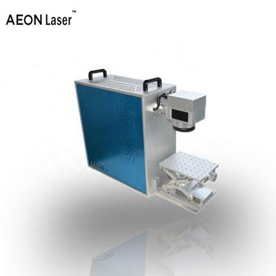 Cina Portable Fiber Laser Marking Machine Fiber Laser Marking Machine Laser Glass Bottle Spotting Cutting Machine in vendita