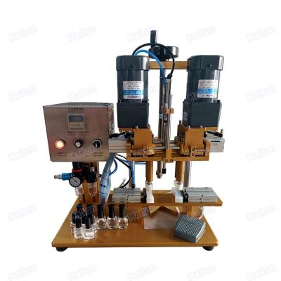 China Food In Running Semi Automatic Manual Juice Capsule Cosmetic Capping Machine for sale