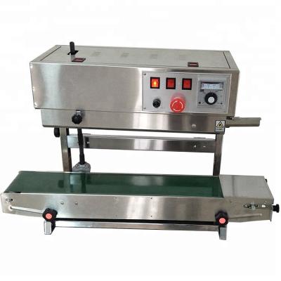 China CLOTHING Stand Pouch Bag Sealing Machine Vertical Continuous Ziplock Sealer for sale