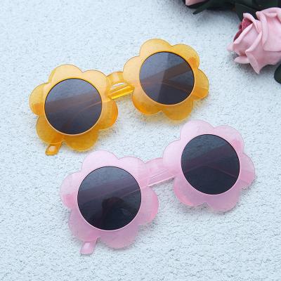 China Children's sunglasses 2022 cute fashion colorful children flower sunglasses for sale