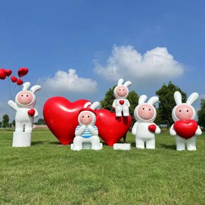 China Eco-friendly Garden Decoration Life Size Fiberglass Ornament Model Outdoor Cartoon Rabbit Statue for sale