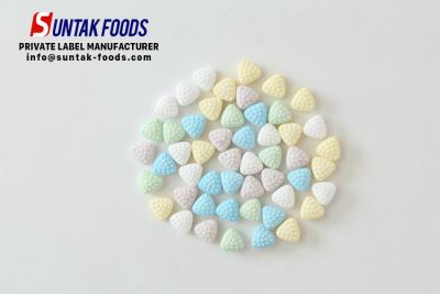 China 0.7g Fruit Flavor Sweet Breath Mints Textured Triangle Candy Shape for sale