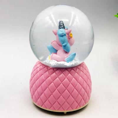 China Europe best selling cheap customized 65mm 40mm 80mm 100mm unicorn polyreisn snow globe for sale