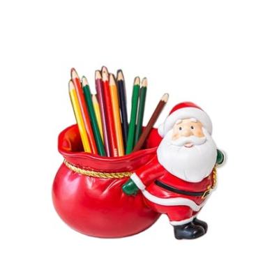 China Custom Christmas Santa Claus Statue Pencil Holders Office Decorative Pen Holder Organizer Christmas Gift from Europe for sale