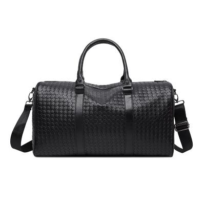 China Factory direct fashion PU travel bag large capacity simple leather weaving duffel bag for sale