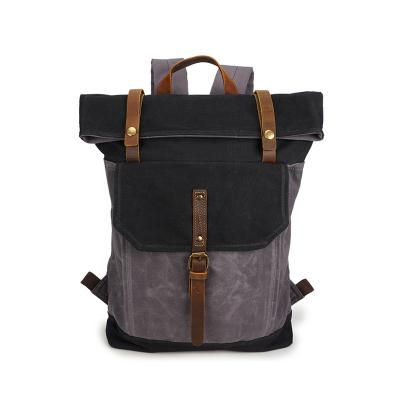 China Vintage Waterproof Wholesale Mens Canvas Backpacks With Leather Trim Universal School Bags for sale