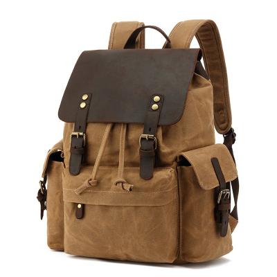 China Manufacturers Directly Vintage Canvas Waterproof Leather Backpack Outdoor Camping Hiking Backpack for sale