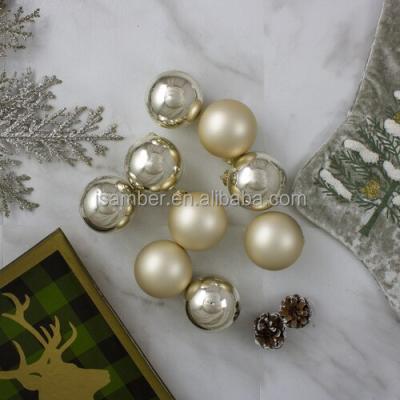 China Hot Sale Unique Decal Gold Glass Ornaments Christmas Tree Baubles For Indoor Christmas Decor for sale