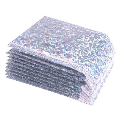 China Waterproof Holographic Metallic Bubble Mailer Charm Colorful Silver Shades Foil Cushion Wedding Bags Padded Mailing Envelopes for sale