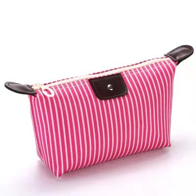 China Fashion Wholesale Striped Foldable Makeup Dumpling Cosmetic Bag Women's Large Capacity Ladies Storage Bag for sale