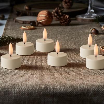 China Birthdays Wedding Decor Plastic Warm White Led 12 Pcs Electric Tea Light Flameless Candle Flame Flicker Battery Operated Set for sale