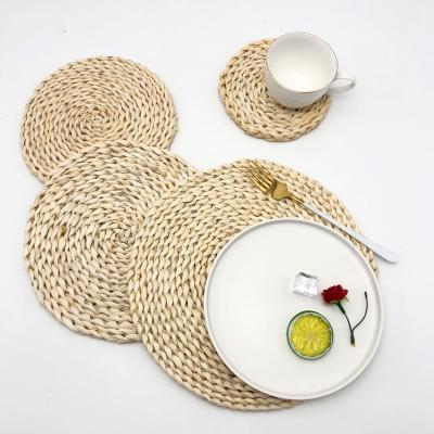 China Straw Woven Rattan Cup Tea Coaster Scallop Oval White Braided Place Mat Boho Minimalist Natural Handmade Decorative Christmas Macrame for sale