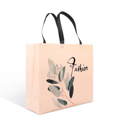 China Tote Fabric Carry Custom Logo Design PP Nonwoven Handled Shopping Bag for sale