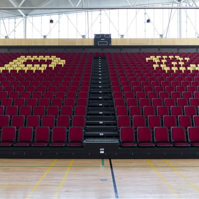 China Anti-UV Indoor Stadium Recessed Automatic Folding Up Telescopic Seat Bleacher for sale