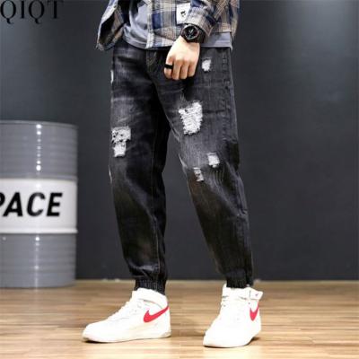 China Custom New Harlan Hole Foot Sweaters Men's Joggers Fashionable Breathable Jogger Sweatpants for sale