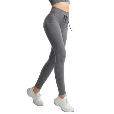 China Breathable Yarn Tied Rope High Waist Yoga Pants Solid Color Sweatpants Butt Tight Women Gaiters for sale