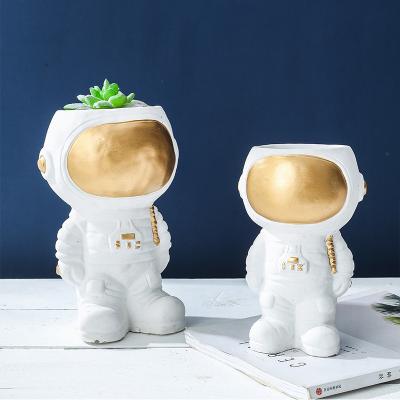 China Modern Creative Astronaut Head Planter Mini Planter Pot Indoor Desktop Ornaments Garden Decor Cement Opens Home Decor for sale