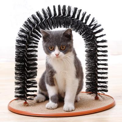 China 2021 Durable Interactive Brush Self Grooming Massage Door Scratcher Scratching Board Puzzle Pet Toys Cat Toy for sale