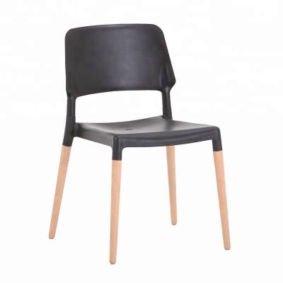 China Leisure chair simple plastic chair with beech wood legs for sale for sale