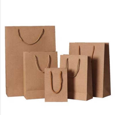 China Recycled Materials Color Kraft Paper Bag With Handles Festival Gift Bag High Quality Shopping Bags for sale