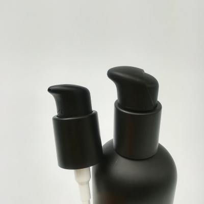 China New Hot Selling Non Refillable Matte Black Treatment Pump 24mm Cream Pump For Foundation BB Cream With Cap for sale