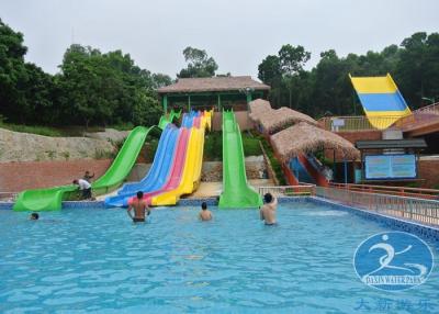 China Multi Lane Ride Adult Water Slide Rainbow Waving Slide With Raft for sale