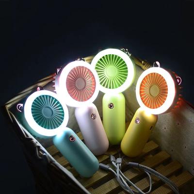 China USB Rechargeable Carry Mini Hand Fan Wrist Hanging Fans Easy Portable Night Light Fan for Kids and Ladies Summer Air Cooler for sale