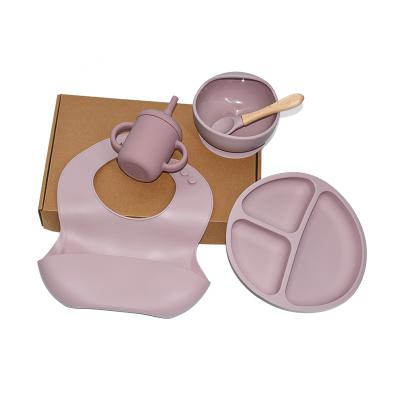 China Legenday BPA Free Silicone Baby Cup Spoon Bibs Roll Set Silicone Dish Round Shape Baby Suction Feeding Dish for sale