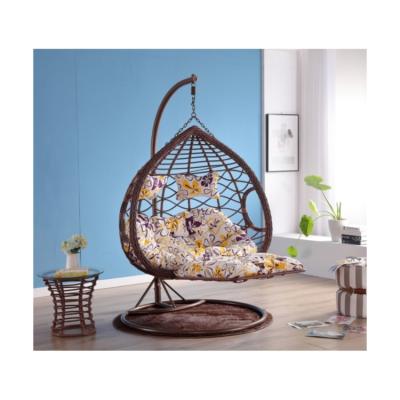 China Large single swing out door garden convertible swing rattan wicker chairs single hanging with table pedal for kids for sale