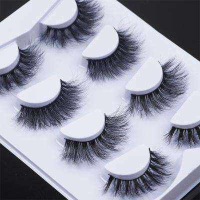 China Custom False Lashes 4 Natural Soft Eyelash Design New 3d Pairs Faux Mink Strip Eyelashes for sale