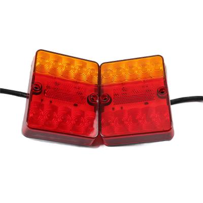 China Multi Voltage Stop/Tail/High Steering Brightness Waterproof EMARK Truck Red+ Amber Yellow Truck LED Tail Lights 12/24 Volt for sale