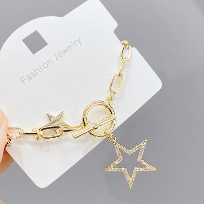 China INS TRENDY Fashion Hollow Star Design Minimalist Gold Plated Diamond Pendant Jewelry Brass Bracelet for sale