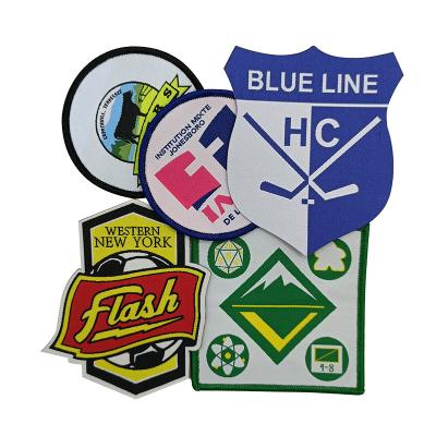 China Durable Textile Fabric Brand Laser Overlock Woven Patch With Iron On Backing For Shoes / Apparel / Garment for sale