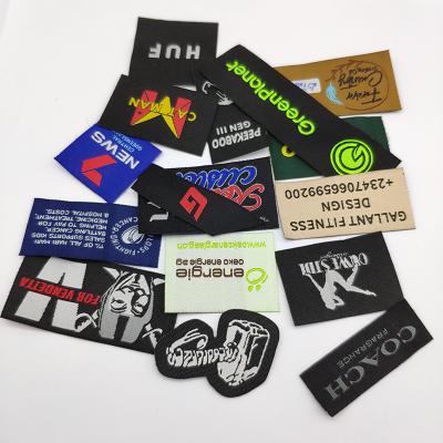 China Factory Sustainable Direct Custom Woven Text Symbol Label Key Labels Directly Cut Apparel Woven Label for sale