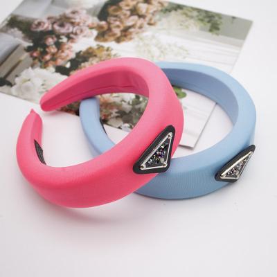 China Environmentally Friendly Milk Sponge Headband Fashion Street Shooting Triangle Letter P Candy Color Headband Hair Accessories Silk Super Light for sale