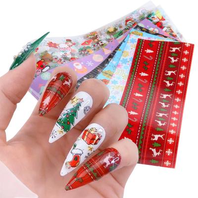 China New Year Winter Nail Transfer Foil Christmas Nail Art Transfer Foil Sticker Winter Santa Claus Slider Paper New Year Decoration Envelopes Snowflakes 10pcs/Set for sale