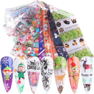 China Nail Foils Transfer Rolls Christmas Decoration Nail Art Foils Santa Claus Moose Snowman Transfer Nail Foils Cute Cartoon Sliders Winter Stickers for sale