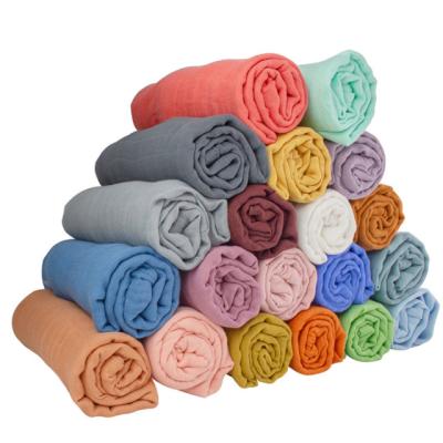 China Anti-pilling Gauze Towel Soft Solid Color Bamboo Organic Muslin Cotton Anti-pilling Wrap Newborn Baby Receiving Blanket for sale