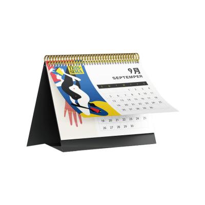 China Reading New Customized Spiral Compulsory Monthly Calendar YO Design Year Table Calendar Wall Calendar Printing With Your Company Logo for sale