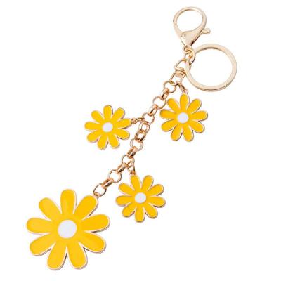 China New Hot Selling Fashionable Custom Flower Keepsake Flower Metal Key Chain for sale