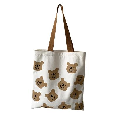 China 100% Eco-friendly Large Capacity Canvas Tote Bag With Pockets Big Bear Shoulder Bags For Woman for sale