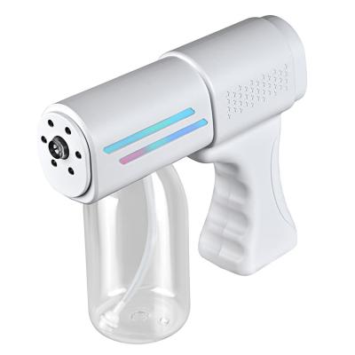 China Family Sterilization Wireless Nano Steam Artillery Battery Disinfection Nano Spray Gun Blue Light Atomization Fogger for sale