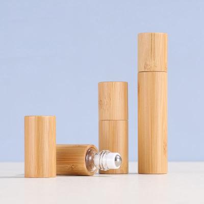 China Hot Sale 5ml 10ml Cosmetic Cosmetic Packaging Perfume Essential Oil Glass Frosted Roll Bamboo Bottles for sale