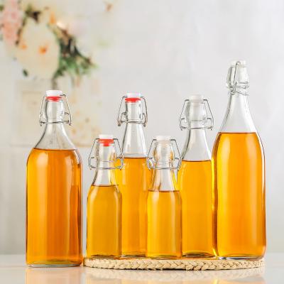 China Non Spill 500ml Kefir Soda Water Beer Kombucha Vinegar Oil Drinks Swing Top Brew Shake Top Glass Bottle With Cap for sale