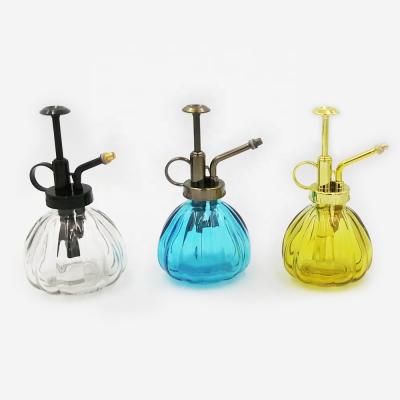 China INFUSION 200ml Flower Clear Colored Glass Plant Sprayer Watering Bottle With 33mm Hand Push Dispenser Pump for sale