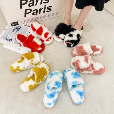 China 2021 fashion trend new women's cow pattern bottom fury main slippers artificial wool hairy thick flat round for sale