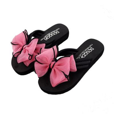 China New Fashion Trend Slippers Summer Thick Rubber Bowknot Single Wedge External Wear Fashion With Flip Flops Women for sale