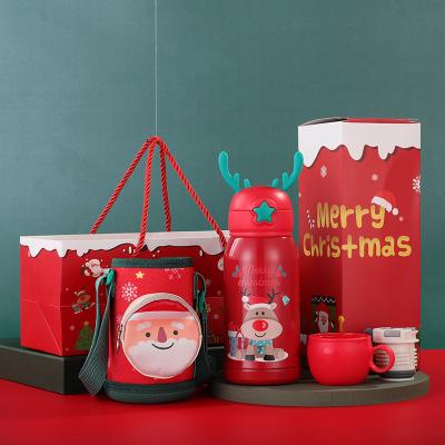 China Merry Christmas Santa Claus Pattern Gift Box Drinking Stainless Steel Stocked Water Bottle With Straw for sale